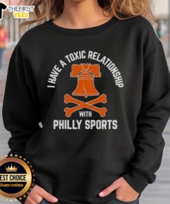 Alt Text: Cozy sweatshirt featuring I Have A Toxic Relationship With Philly Sports design, perfect for hockey fans.