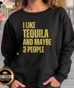 Cozy 'I Like Tequila And Maybe 3 People' sweatshirt featuring playful typography, perfect for casual outings.