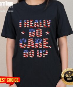 Alt Text: Top I Really Do Care Do U USA Flag Ladies Tee showcasing patriotic design for women, perfect for casual wear.