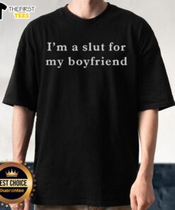 Alt Text: Trendy black 'I'm A Slut For My Boyfriend' t-shirt displayed on a model, showcasing playful relationship humor.