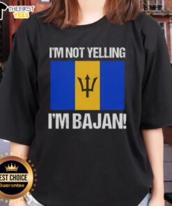 Alt Text: Bajan flag ladies tee featuring the phrase 'I'm Not Yelling, I'm Bajan' in vibrant colors, perfect for casual wear.