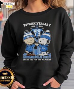 Alt Text: Cozy Indianapolis Colts sweatshirt featuring Snoopy and Charlie Brown for the 73rd Anniversary (1953-2026).