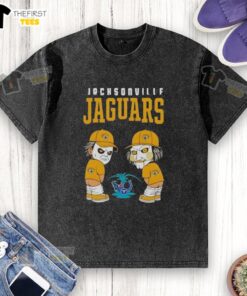 Alt Text: Top Jacksonville Jaguars X Michael Myers and Billy the Puppet design on a washed T-shirt for fans and collectors.