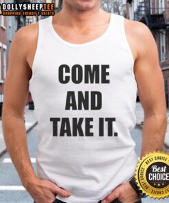 Kiernan Shipka wearing a stylish 'Come And Take It' tank top, showcasing a trendy summer fashion look.