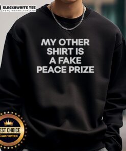 Alt Text: Top My Other Shirt Is A Fake Peace Prize Sweatshirt in vibrant colors, showcasing a unique and humorous design.