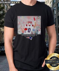 Alt Text: Top New England Patriots Christian Gonzalez NFL 2026 photo t-shirt featuring vibrant team colors and player design.