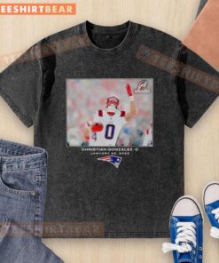 Alt Text: Christian Gonzalez in a New England Patriots washed T-shirt, showcasing his NFL style for 2026 season.