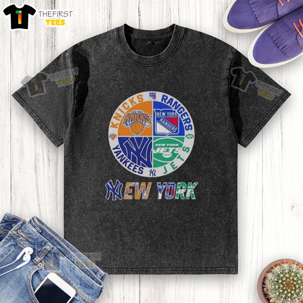 top-new-york-city-sports-knicks-rangers-jets-yankees-logos-combine-washed-t-shirt Alt Text: Top New York City sports logos on a combined washed t-shirt featuring Knicks, Rangers, Jets, and Yankees.