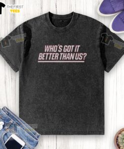 Top New York Giants 'Who's Got It Better Than Us' washed t-shirt displayed on a wooden surface, showcasing team spirit.