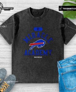 Buffalo Bills Miracle Academy Nahmias Washed T-Shirt displayed on a hanger, showcasing vibrant colors and team spirit.
