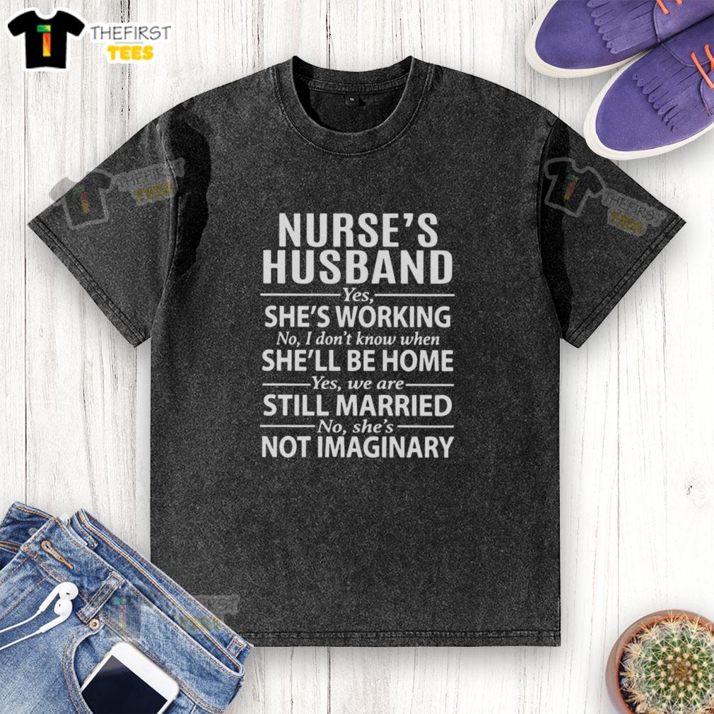 top-nurses-husband-yes-shes-working-no-i-dont-know-when-shell-be-home-washed-t-shirt Alt Text: Top Nurses Husband T-Shirt: 'Yes, she's working. No, I don't know when she'll be home' - a humorous take on nursing life.