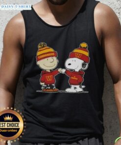 Charlie Brown and Snoopy fist bump on a Washington Commanders football tank top featuring top peanuts design.