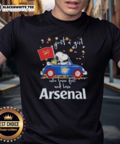 Alt Text: Peanuts Snoopy driving a car on a fall-themed t-shirt for girls who love Arsenal FC and autumn vibes.