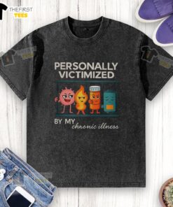 Top Personally Victimized By My Chronic Illness washed t-shirt displayed on a hanger, showcasing its soft fabric and bold print.