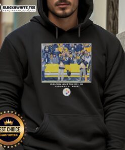 Alt Text: Calvin Austin III wearing a Pittsburgh Steelers Big & Tall hoodie during NFL Week 18, showcasing team spirit.