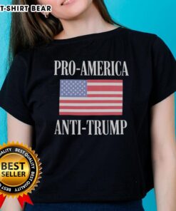 Top Pro America Anti-Trump Ladies Tee featuring bold graphic design promoting political activism and women's rights.