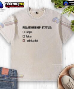 Funny washed t-shirt with 'Top Relationship Status: Single, Taken, I Drink A Lot' design, perfect for casual wear.