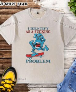 Top Screaming Hand graphic on a washed T-shirt with 'I Identify As A Fcking Problem' text for edgy streetwear style.