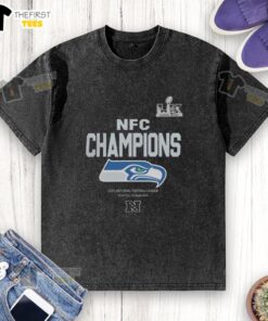 Top Seattle Seahawks 2025 NFL Champions Super Bowl LX roster washed t-shirt displayed on a wooden surface.