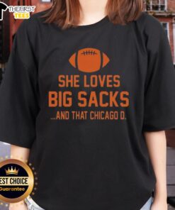 Top She Loves Big Sacks and That Chicago D Ladies Tee featuring a stylish graphic design in vibrant colors.