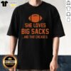 Alt Text: Top She Loves Big Sacks And That Chicago D T-Shirt displayed on a mannequin, showcasing a trendy and playful design.