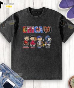 Alt Text: Top Snoopy and Charlie Brown graphic on Chicago sports teams washed t-shirt featuring Blackhawks, Bulls, Cubs, Bears.