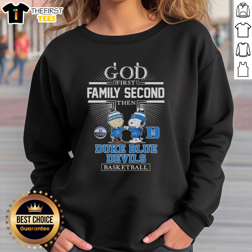 top-snoopy-fist-bump-charlie-brown-god-first-family-second-then-duke-blue-devils-basketball-sweatshirt Alt Text: Snoopy and Charlie Brown fist bump on a sweatshirt, featuring 'God First, Family Second, Duke Blue Devils Basketball' design.