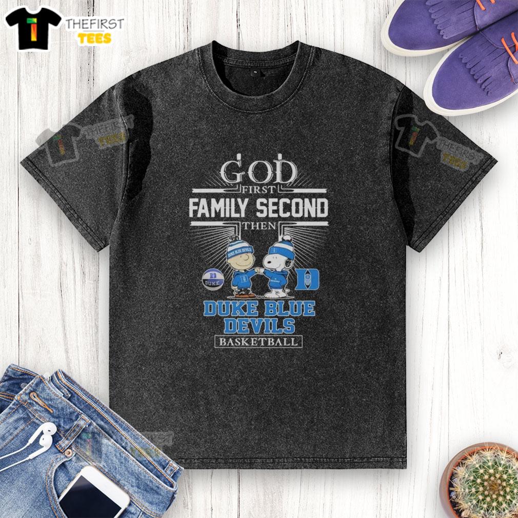 top-snoopy-fist-bump-charlie-brown-god-first-family-second-then-duke-blue-devils-basketball-washed-t-shirt Top Snoopy fist bump with Charlie Brown design on 'God First, Family Second' Duke Blue Devils basketball washed t-shirt.
