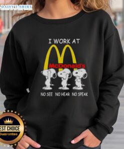 Alt Text: Snoopy I Work At McDonald's sweatshirt featuring a playful No See, No Hear, No Speak design, perfect for fans.