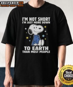Alt Text: Top Snoopy 'I'm Not Short I'm Just More Down To Earth Than Most People' T-Shirt featuring a playful Snoopy graphic.