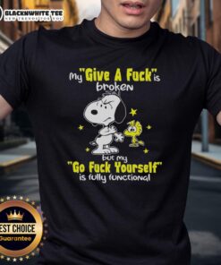 Top Snoopy 'My Give A Fck Is Broken' T-Shirt design featuring humorous graphic and playful typography.