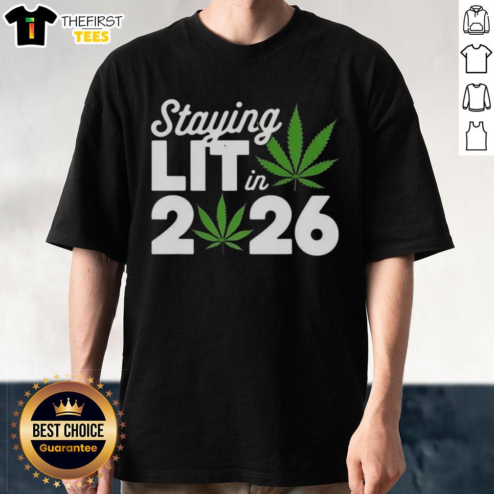 top-staying-lit-in-2026-marijuana-meme-t-shirt Top Staying Lit In 2026 Marijuana Meme T-Shirt featuring a humorous cannabis graphic and bold text design.