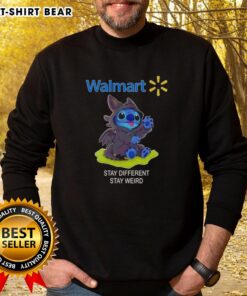 Top Stitch Cosplay Toothless X Walmart sweatshirt featuring unique design, promoting 'Stay Different, Stay Weird' message.