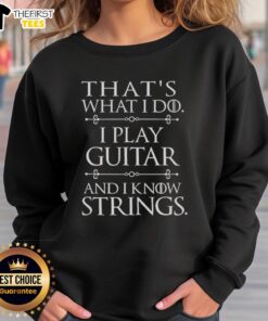 Cozy sweatshirt featuring 'That's What I Do, I Play Guitar and Know Things' design, perfect for guitar enthusiasts.