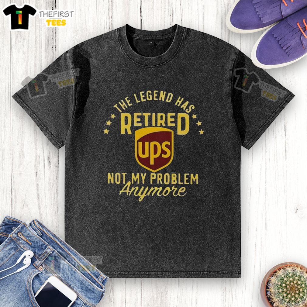 top-the-legend-has-retired-ups-not-my-problem-anymore-washed-t-shirt Alt Text: Top The Legend Has Retired washed t-shirt, featuring a humorous design, perfect for casual wear and fan apparel.