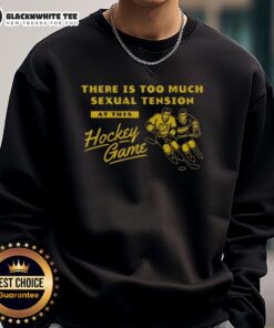 Vintage sweatshirt featuring 'Too Much Sexual Tension At This Hockey Game' graphic, perfect for sports enthusiasts and humor lovers.