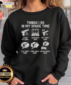 Cozy sweatshirt featuring the phrase 'Top Things I Do In My Spare Time: Clean Guns, Research Guns, Buy More Guns'.