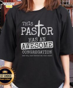 Pastor with enthusiastic congregation wearing 'Top This' tees, showcasing community spirit and faith engagement.