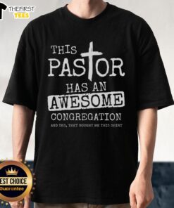 Pastor wearing 'Top This' T-shirt with a joyful congregation at a lively church service, showcasing community spirit.