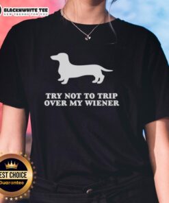 Womens tee featuring 'Top Try Not To Trip Over My Wiener' design, perfect for dog lovers and humor enthusiasts.