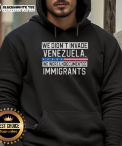 Top We Didn't Invade Venezuela Hoodie featuring a bold statement on undocumented immigrants, ideal for casual wear.