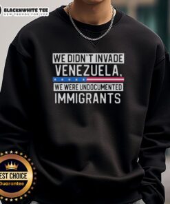 Top We Didn't Invade Venezuela sweatshirt featuring a bold graphic design, perfect for undocumented immigrants advocacy.