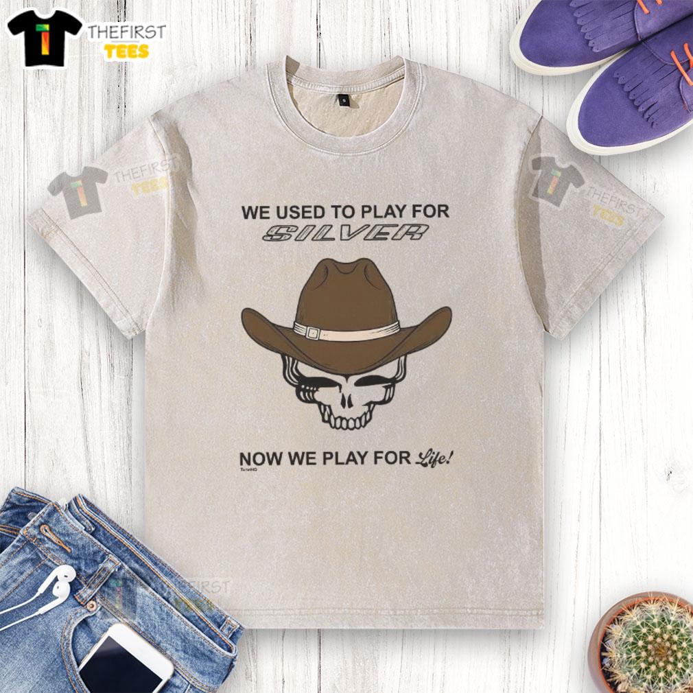 top-we-used-to-play-for-silver-now-we-play-for-life-washed-t-shirt Top We Used To Play For Silver Now We Play For Life Washed T-Shirt displayed on a rustic wooden background.