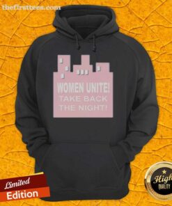 Women wearing 'Top Women Unite Take Back The Night' hoodies at a rally promoting empowerment and safety for all.