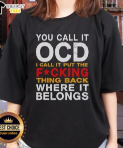 Top You Call It OCD I Call It Put The Fcking Thing Back Ladies Tee in black, featuring a humorous quote design.