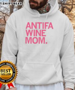 Trendy Top Antifa Wine Mom Hoodie featuring bold graphics, perfect for stylish protestors and wine enthusiasts.