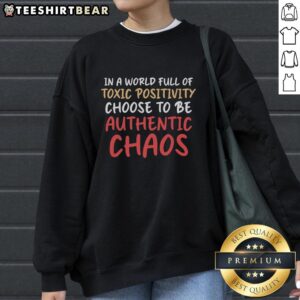 Premium Chaos sweatshirt promoting authenticity over toxic positivity, featuring a bold design and comfortable fit.
