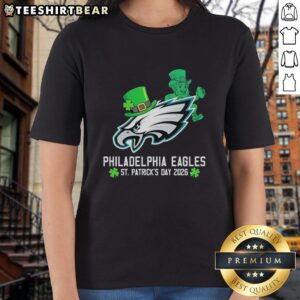 Official Philadelphia Eagles Football St. Patrick's Day 2026 Ladies Tee featuring festive green design and team logo.