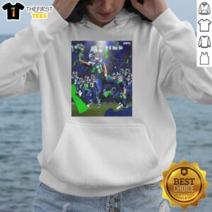 Jaxon Smith-Njigba in Seattle Seahawks Super Bowl LX Champions 2026 hoodie, celebrating victory on the field.