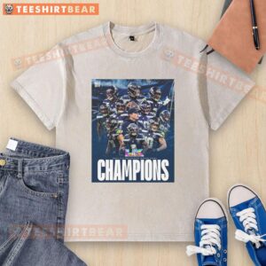 Alt Text: Seattle Seahawks Super Bowl LX 2026 champions graphic on a washed t-shirt, showcasing team pride and style.